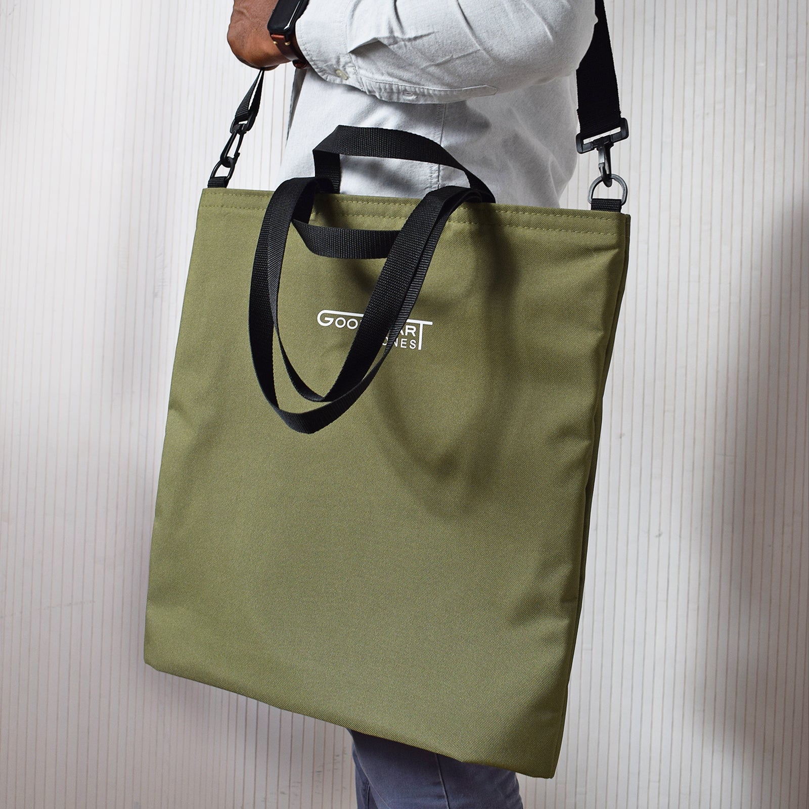 GoodDay Tote Bag in Olive Green with adjustable shoulder strap and two handles, showcasing its stylish and multifunctional design.