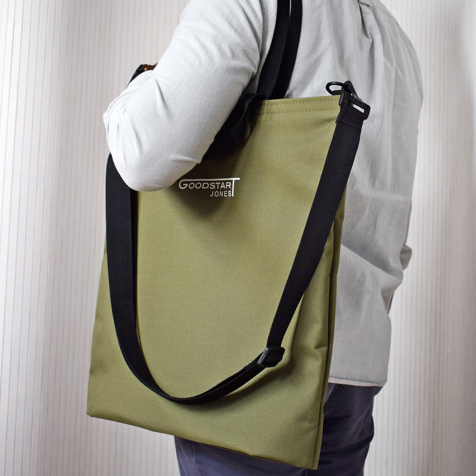 GoodDay Tote Bag in Olive Green with adjustable shoulder strap and two handles, showcasing its stylish and multifunctional design.