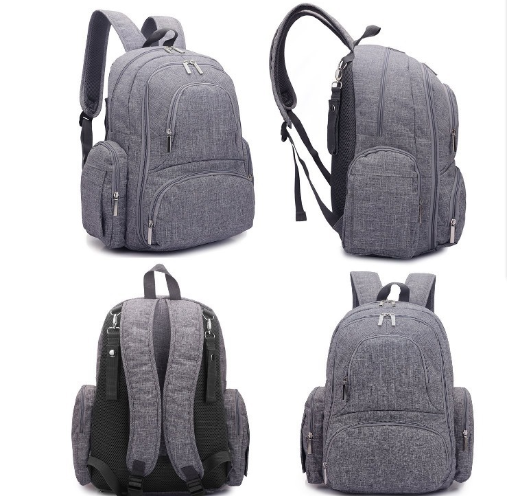 Gray multi-function mummy bag with large capacity, featuring double straps and zipper pockets, ideal for parents.