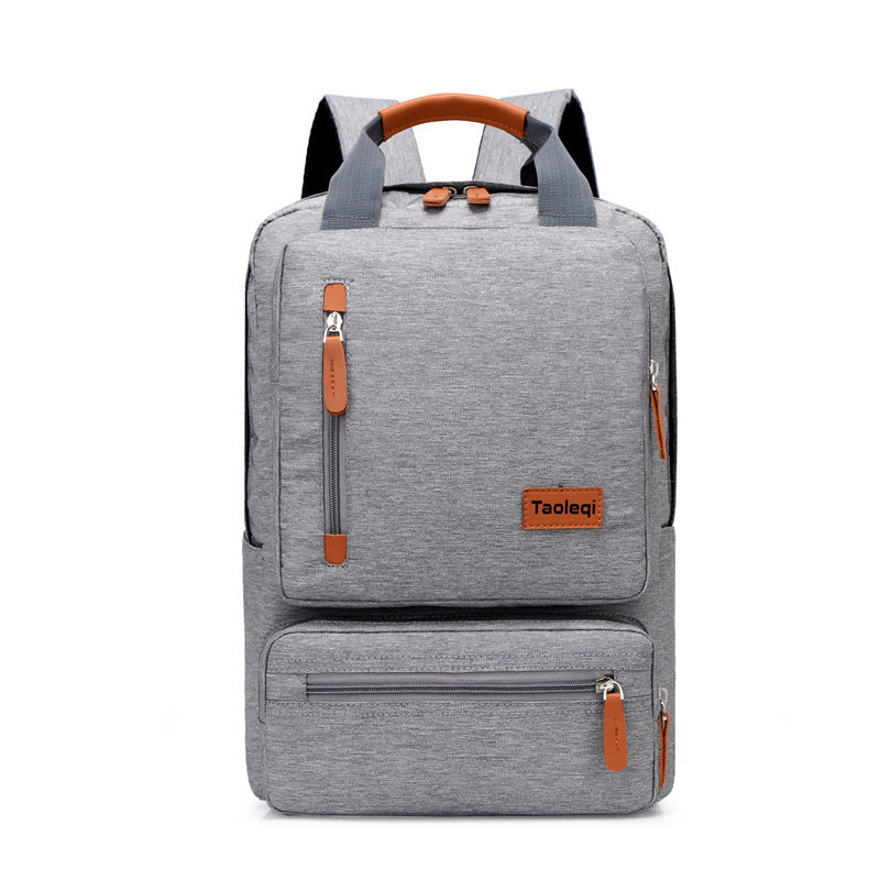 High Quality Fashion Business and Leisure Travel Backpack in stylish design, made of durable Oxford cloth, featuring double root straps and zipper opening.
