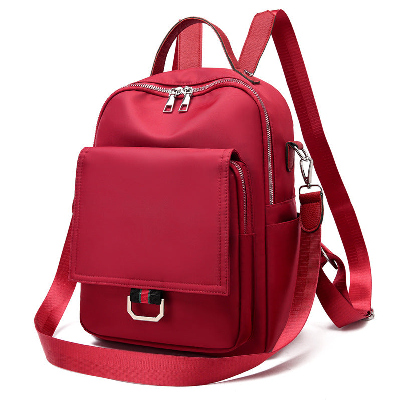 Ladies Oxford Cloth Korean Leisure Multifunctional Backpack in stylish color contrast, featuring three shoulder straps and a soft handle.