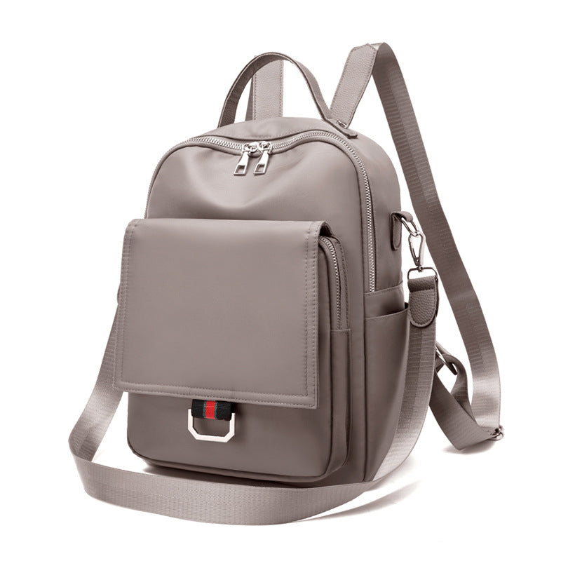 Ladies Oxford Cloth Korean Leisure Multifunctional Backpack in stylish color contrast, featuring three shoulder straps and a soft handle.