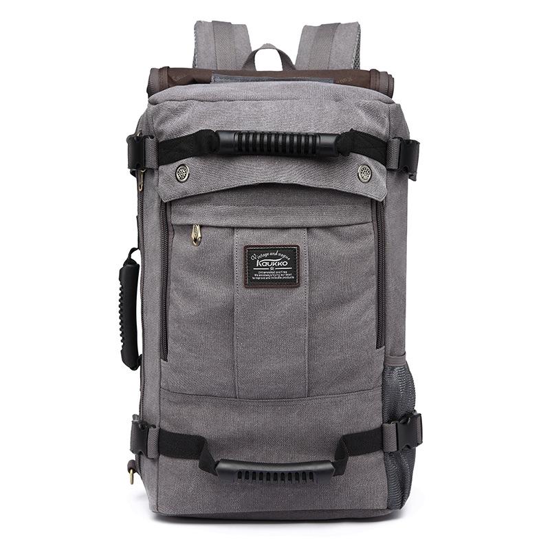 Large Canvas Waterproof Mountaineering Bag in outdoor setting, showcasing its durable material and spacious design.