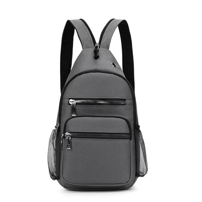 Large Capacity Fashion Oxford Sports Backpack in plain design, showcasing multiple pockets and adjustable straps.