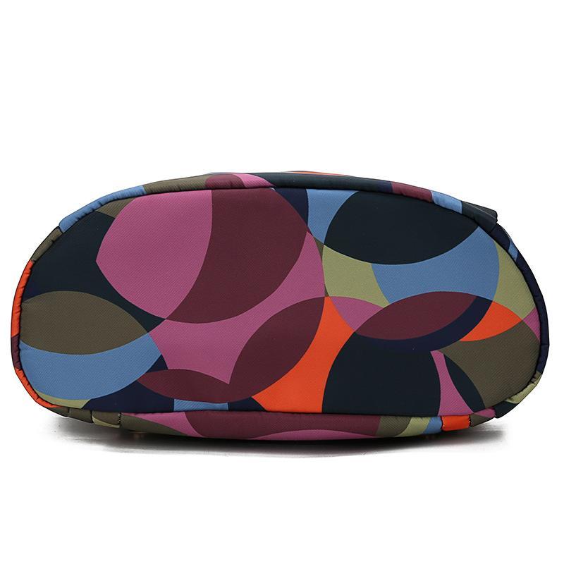 Large Oxford Cloth Outdoor Travel Anti-theft Backpack in various colors, showcasing its spacious design and durable material.