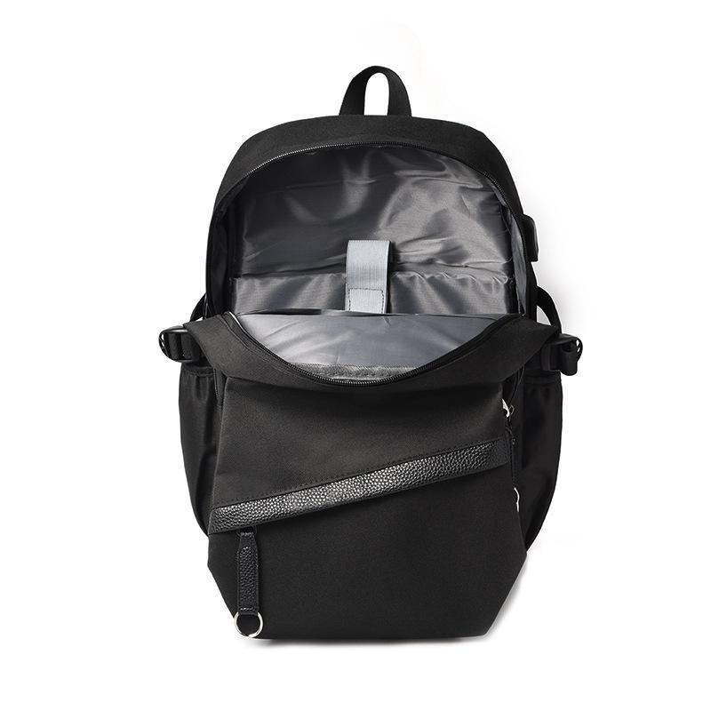 A stylish canvas travel backpack designed for male and female students, featuring a gradient pattern and multiple pockets for organization.