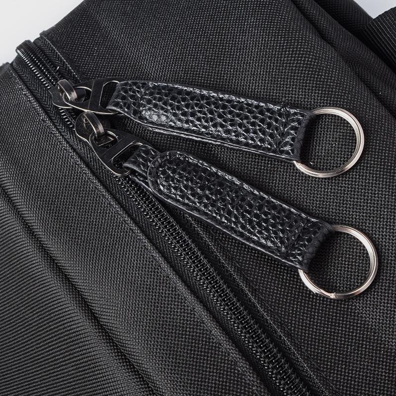 A stylish canvas travel backpack designed for male and female students, featuring a gradient pattern and multiple pockets for organization.