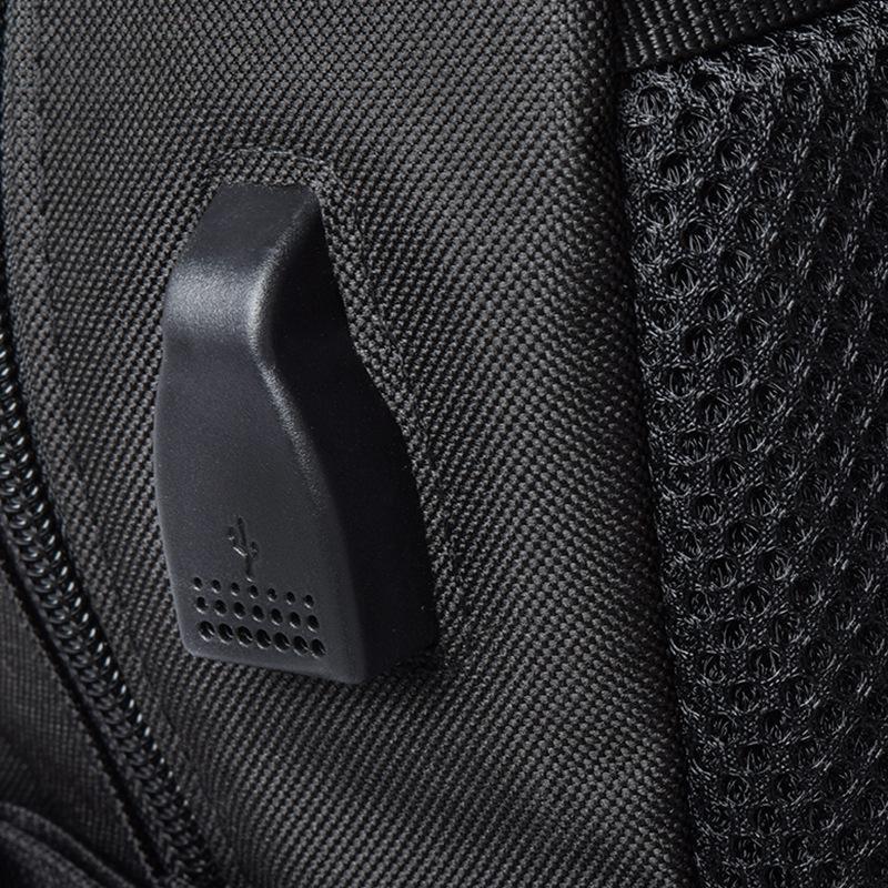 A stylish canvas travel backpack designed for male and female students, featuring a gradient pattern and multiple pockets for organization.