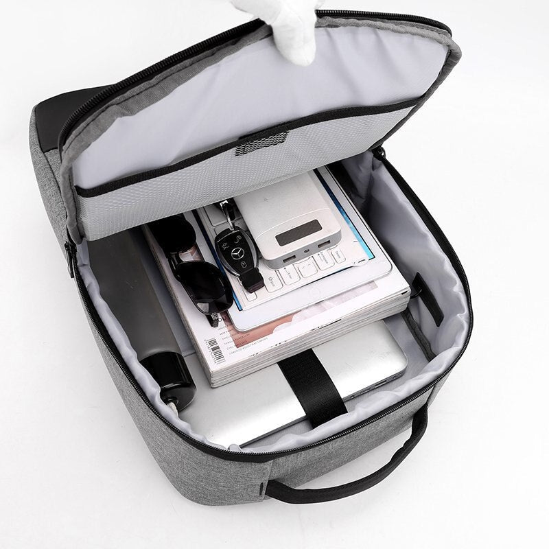 Man Backpack Multifunction USB Charging Bag in black nylon, featuring USB charging port and spacious compartments for laptops and essentials.