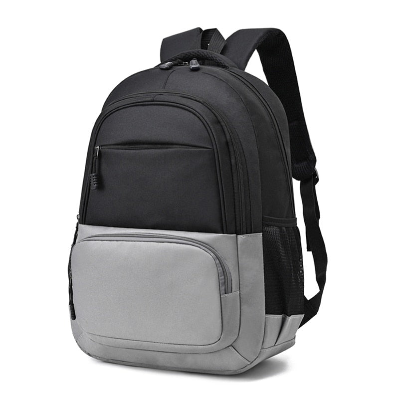 Men's nylon backpack featuring a stylish panelled design, multiple compartments, and a soft handle, ideal for daily use and travel.