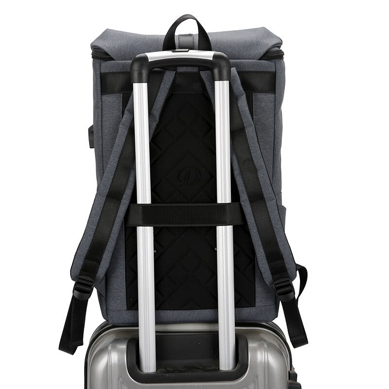 Men's multifunctional backpack with USB charging port, waterproof design, and multiple pockets for organization, suitable for business and travel.