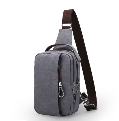 Men's Canvas Crossbody Bag designed for hiking, featuring adjustable strap and durable fabric.