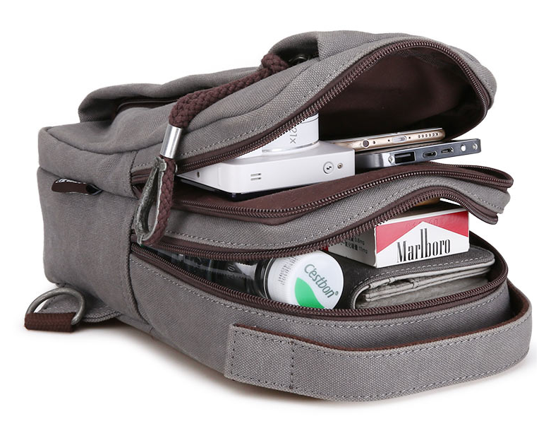 Men's Canvas Crossbody Bag designed for hiking, featuring adjustable strap and durable fabric.