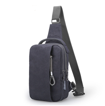 Men's Canvas Crossbody Bag designed for hiking, featuring adjustable strap and durable fabric.