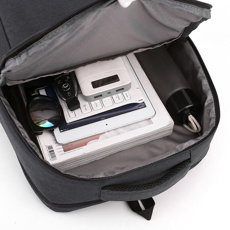 Mens Urban USB Charging Luxury Waterproof Laptop Backpack in black nylon with multiple compartments and USB charging port.