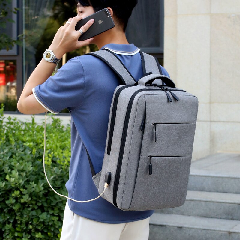 Mens Waterproof Oxford Cloth Multifunctional Laptop Rucksack featuring multiple pockets and a sleek design, ideal for business and travel.