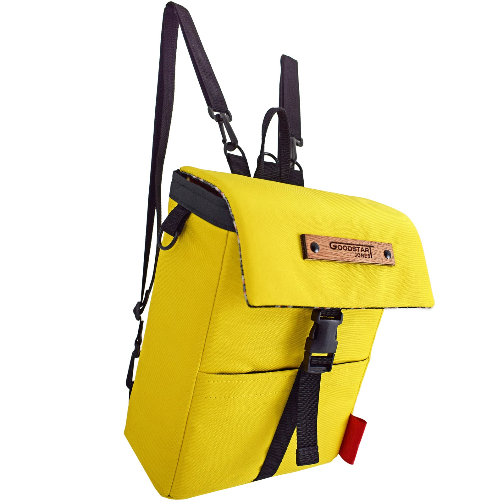 Mini Merchant Backpack in bright yellow, showcasing its multifunctional design as a backpack and crossbody bag.