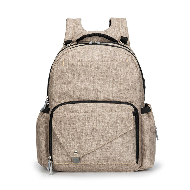 Multi-function waterproof mommy backpack in stylish design, featuring durable nylon fabric and spacious compartments for baby essentials.