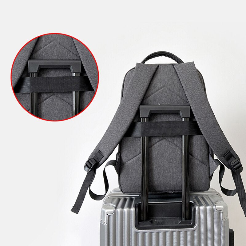 Multifunctional business waterproof Oxford cloth backpack designed for laptops, featuring USB charging port and multiple interior pockets.