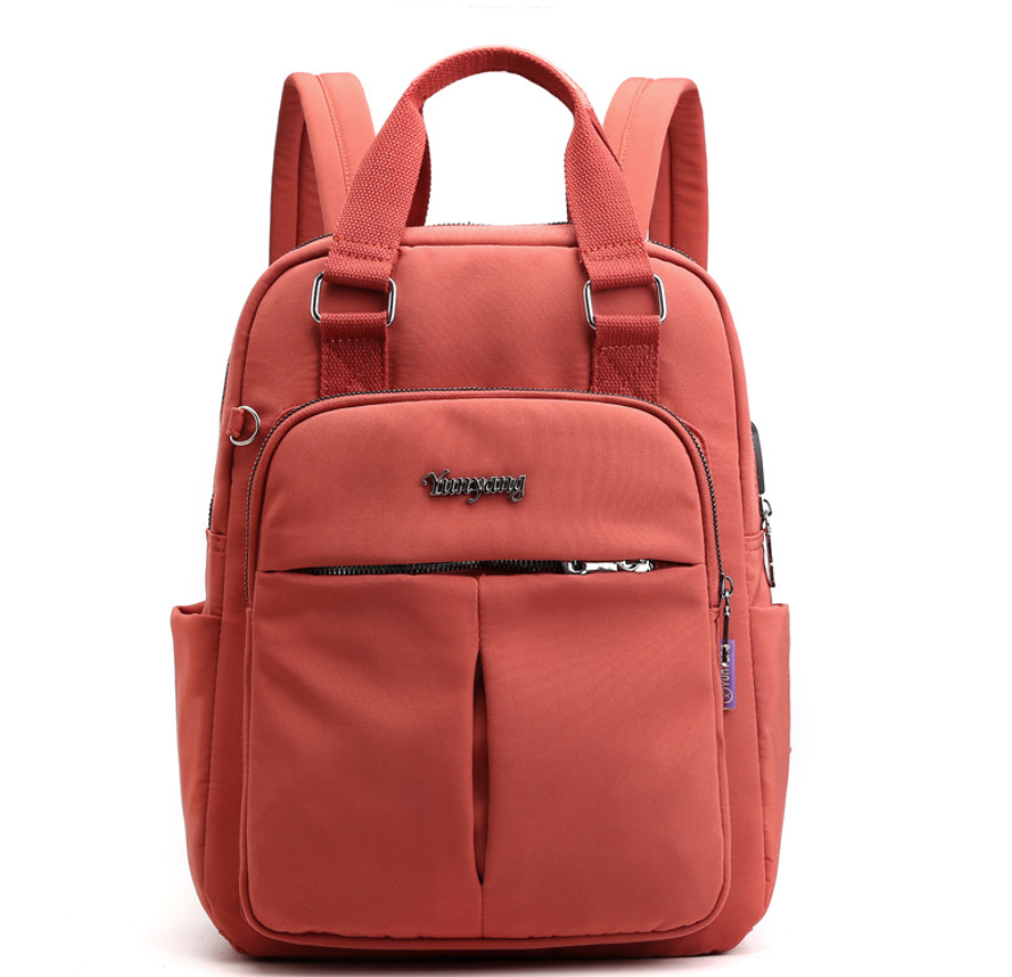Nylon fashion backpack with USB port, featuring a stylish square design, durable nylon material, and double straps for comfort.