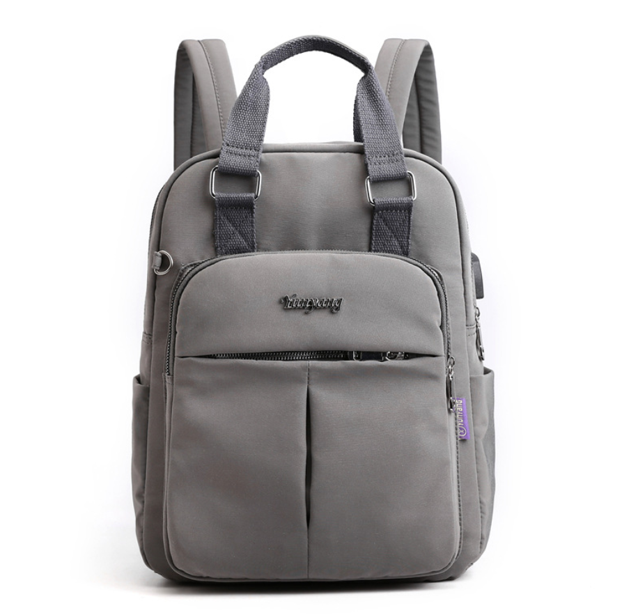 Nylon fashion backpack with USB port, featuring a stylish square design, durable nylon material, and double straps for comfort.