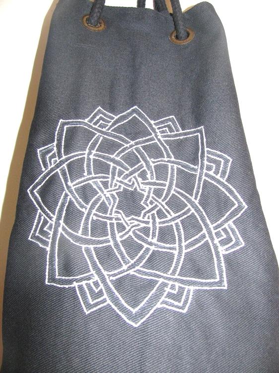 Omsutra Kids Mandala Yoga Mat Bag featuring a vibrant mandala design and golden saree lace border, perfect for young yogis.