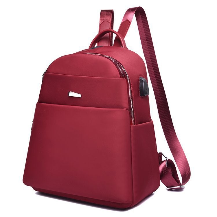 Oxford Cloth Fashion Casual Backpack featuring a USB port, waterproof design, and stylish street fashion elements.