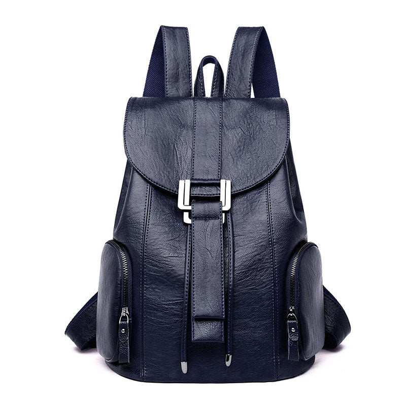 Stylish PU leather ladies backpack with draw buckle and belt decoration, featuring a soft texture and double straps.