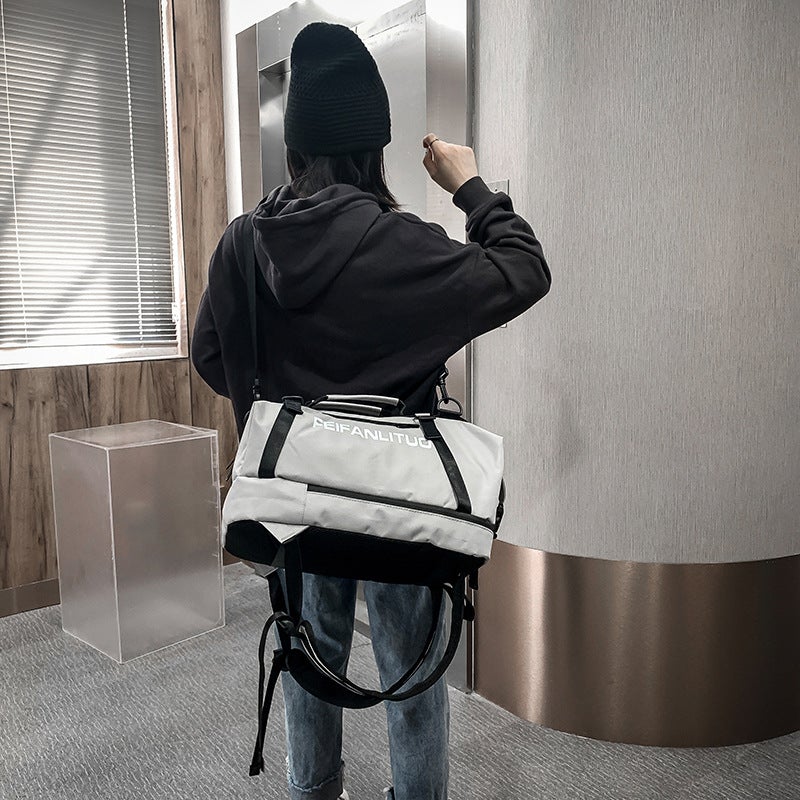 Unisex Sports Gym Men's Fitness Backpack made of water-resistant oxford cloth, featuring multiple pockets and a stylish design.