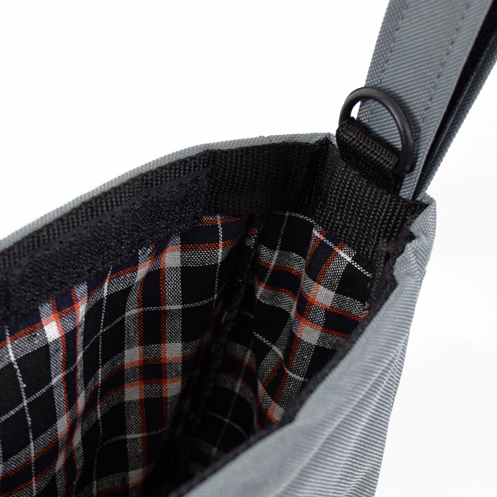 Grey UTILITY Pouch Grab Bag with cushioned interior and adjustable straps, ideal for organizing small items.