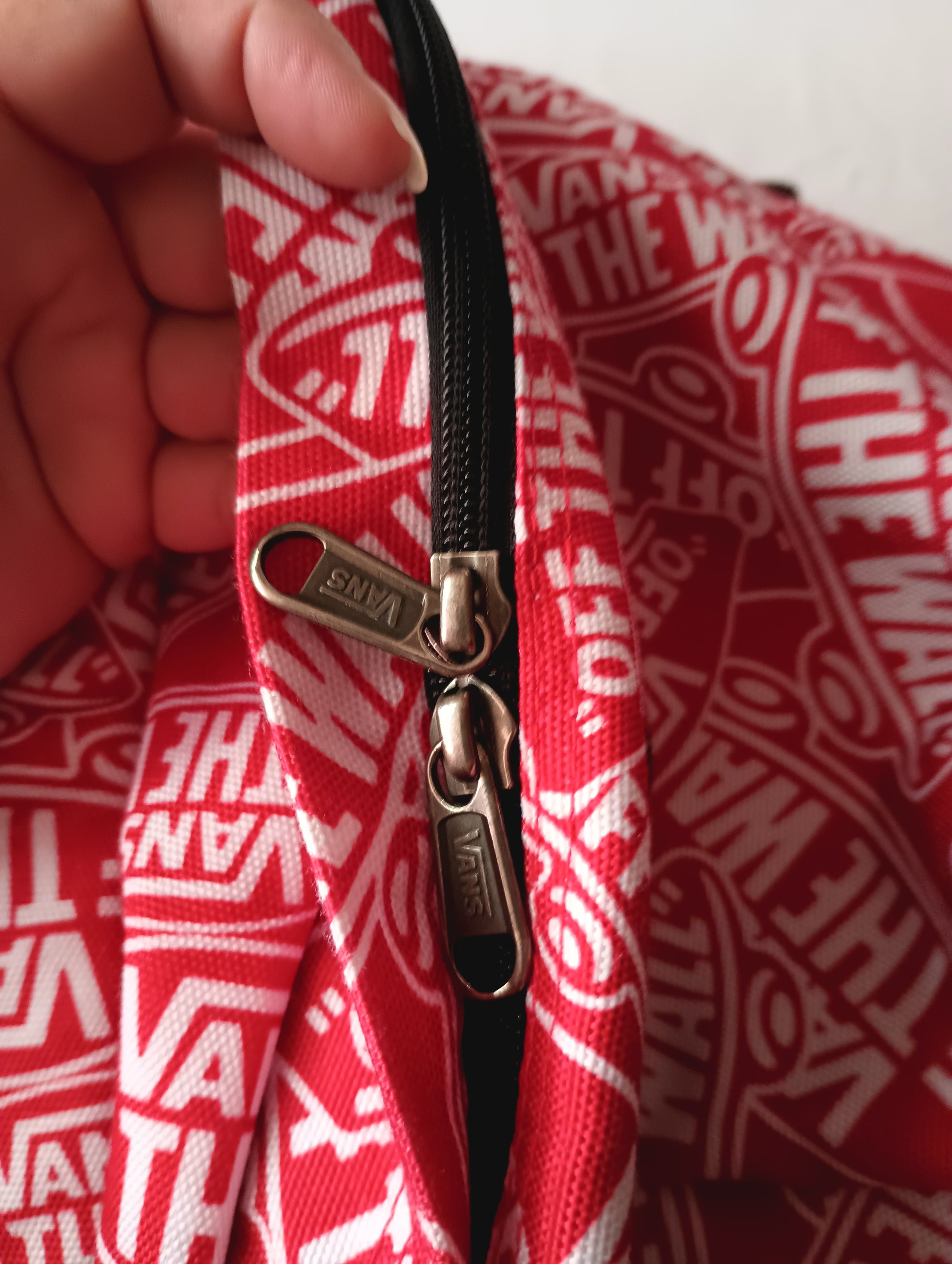 VANS Old Skool II Red Backpack featuring red and white colors with the iconic VANS logo.