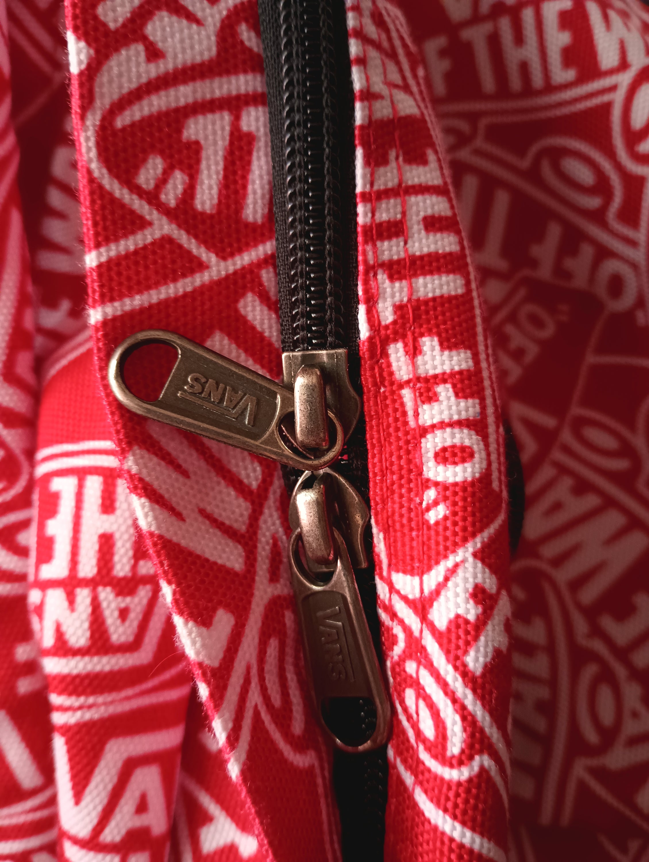 VANS Old Skool II Red Backpack featuring red and white colors with the iconic VANS logo.