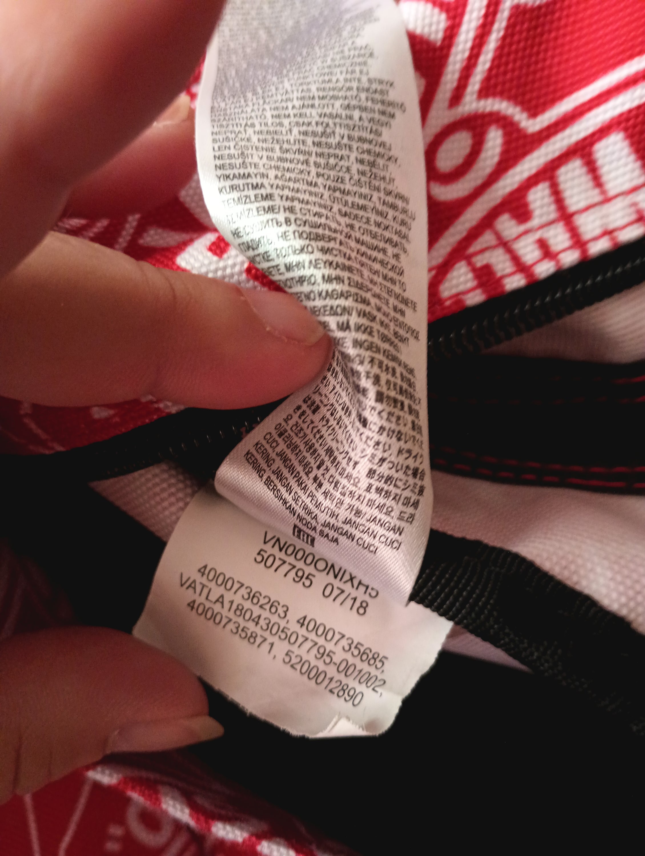 VANS Old Skool II Red Backpack featuring red and white colors with the iconic VANS logo.