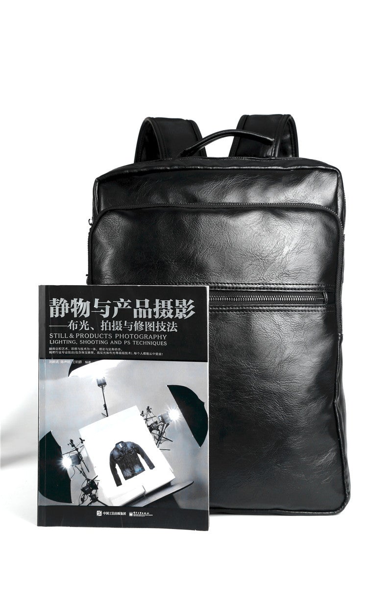 Waterproof 15.6 inch PU leather laptop backpack for men, featuring multiple compartments and padded shoulder straps.