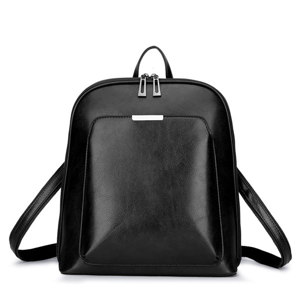 A stylish waterproof multifunctional backpack made of oil wax leather, featuring adjustable straps and anti-theft design.