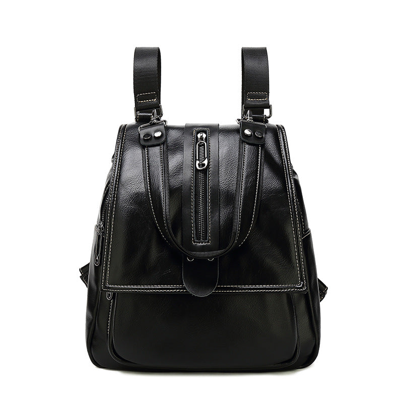 A stylish Women's Multifunctional and Large Capacity Backpack in black and brown, showcasing its soft texture and spacious design.