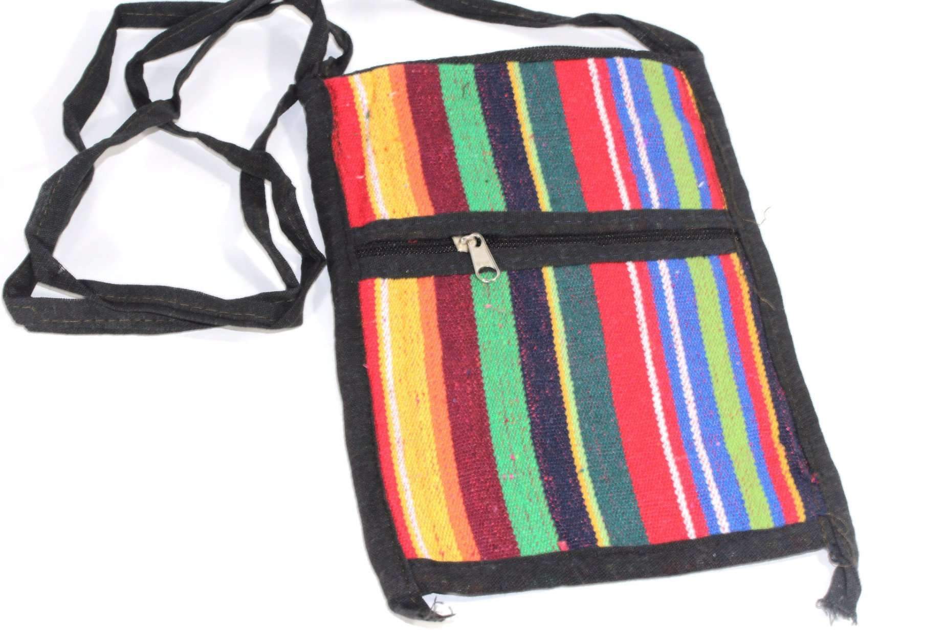 A colorful Passport Cross Body Purse made from durrie cotton, featuring a long strap and zipper closure, ideal for carrying essentials while traveling.