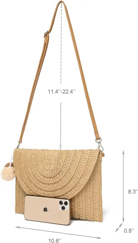 A stylish straw woven raffia envelope clutch bag with intricate weaving, perfect for bohemian fashion lovers.