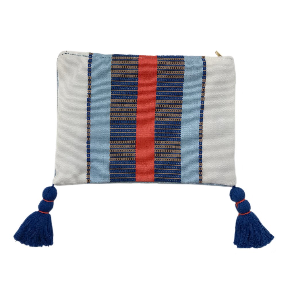 White Striped Backstrap Clutch handmade from cotton, featuring vibrant stripes and tassels, showcasing traditional Guatemalan weaving techniques.