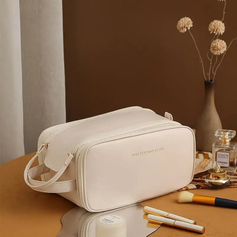 Three Layer Double Zipper Cosmetic Bag in stylish PU leather, featuring a U-shaped design and three spacious layers for organized beauty essentials.