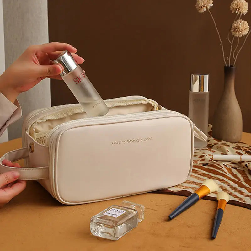 Three Layer Double Zipper Cosmetic Bag in stylish PU leather, featuring a U-shaped design and three spacious layers for organized beauty essentials.