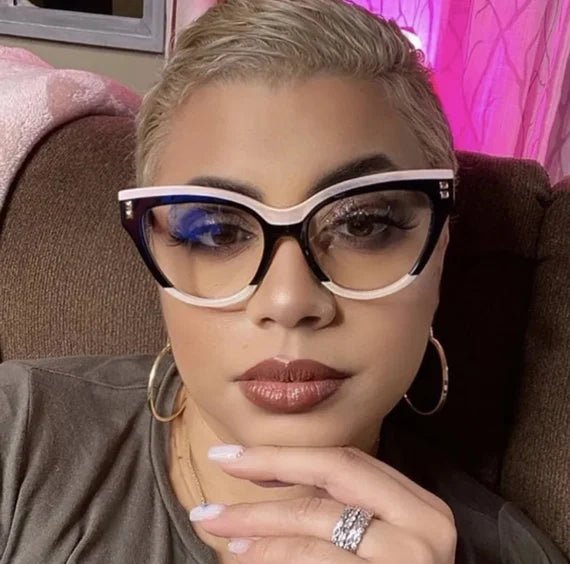 A pair of stylish CatEye Designer Frames in a chic design, perfect for fashion and prescription lenses, displayed with a free leather case.