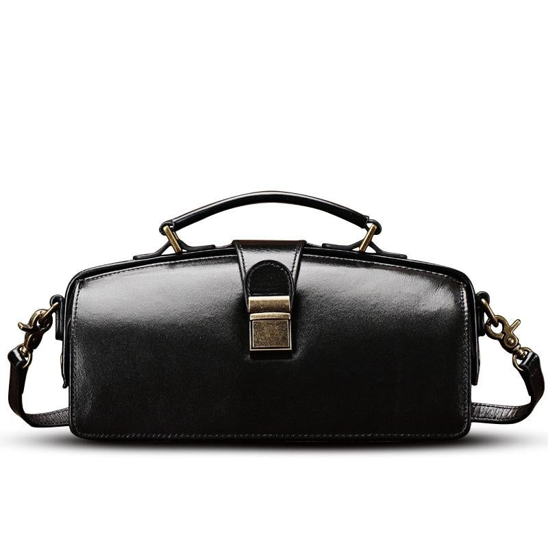 A stylish Classy Leather Doctor Bag made from genuine leather, featuring vintage hardware and a detachable strap for versatile wear.