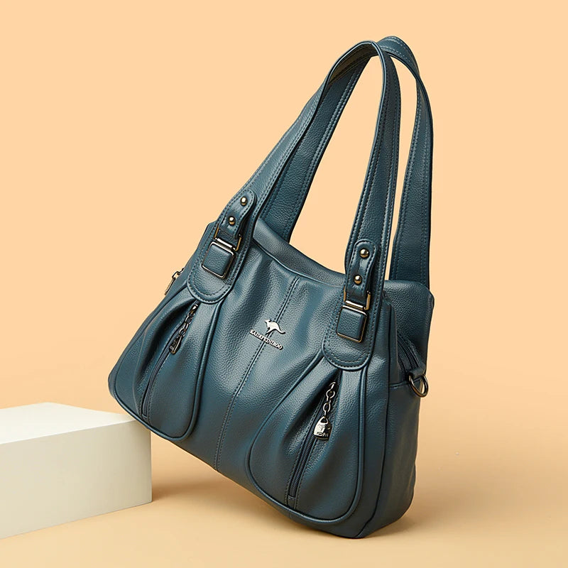Elegant Leather Handbag showcasing high-quality leather, spacious interior, and classic design, perfect for fashion-forward women.