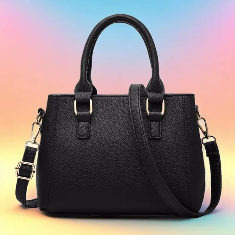 A stylish embroidered leather handbag with a unique design, featuring an adjustable strap and spacious interior, perfect for women on the go.