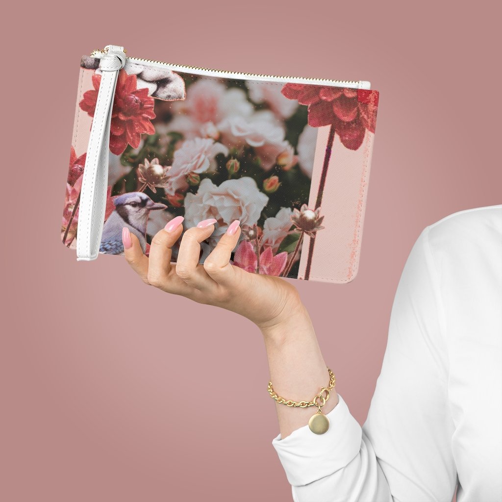 Floral Grunge Design Zipped Clutch Bag in vegan leather with Saffiano pattern, featuring a loop handle and zip fastening.