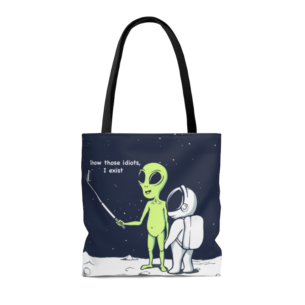Funny Alien Tote Bag with humorous design, featuring black cotton handles and spacious interior for everyday use.