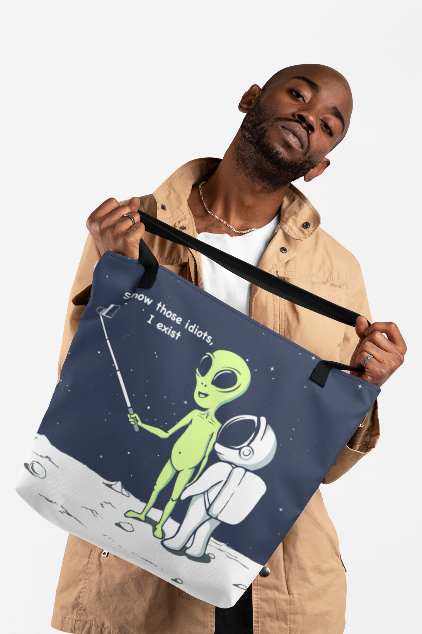 Funny Alien Tote Bag with humorous design, featuring black cotton handles and spacious interior for everyday use.