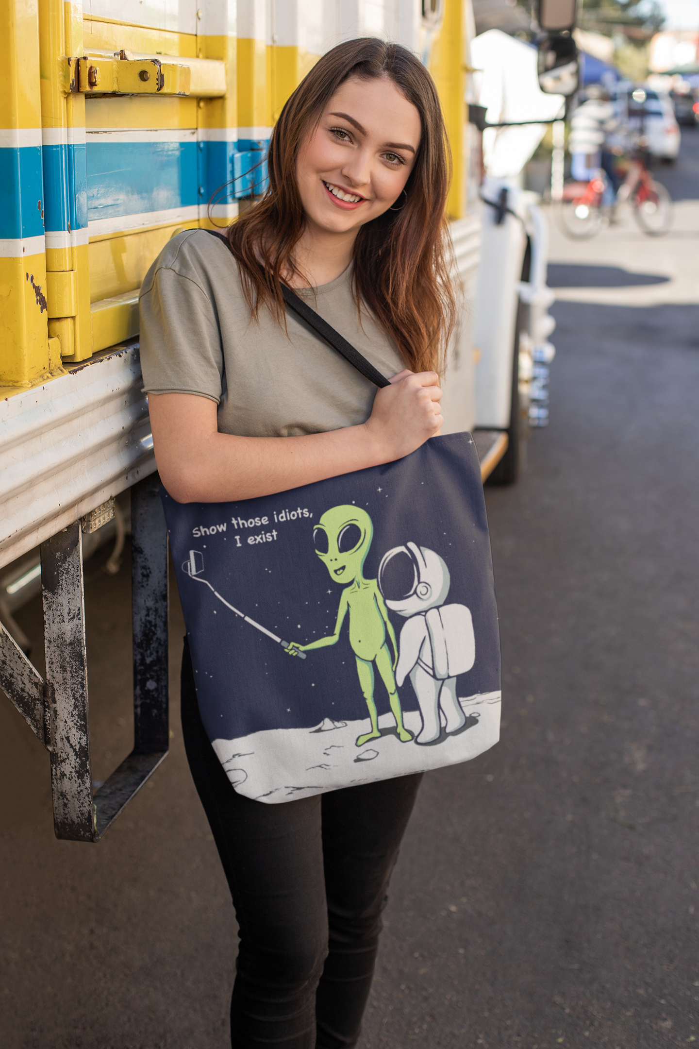 Funny Alien Tote Bag with humorous design, featuring black cotton handles and spacious interior for everyday use.