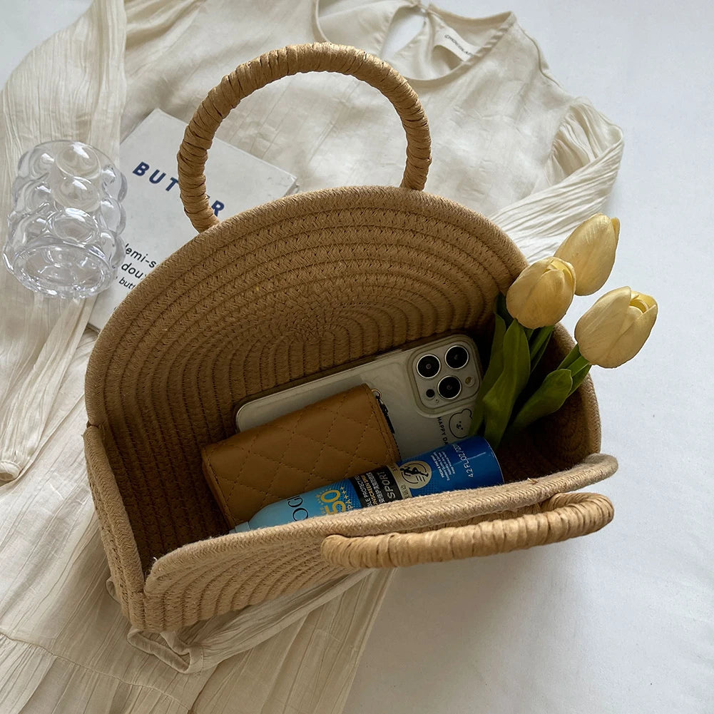 A vibrant handwoven clutch purse by Sexikinis Swim, perfect for beach outings, showcasing intricate patterns and colors.